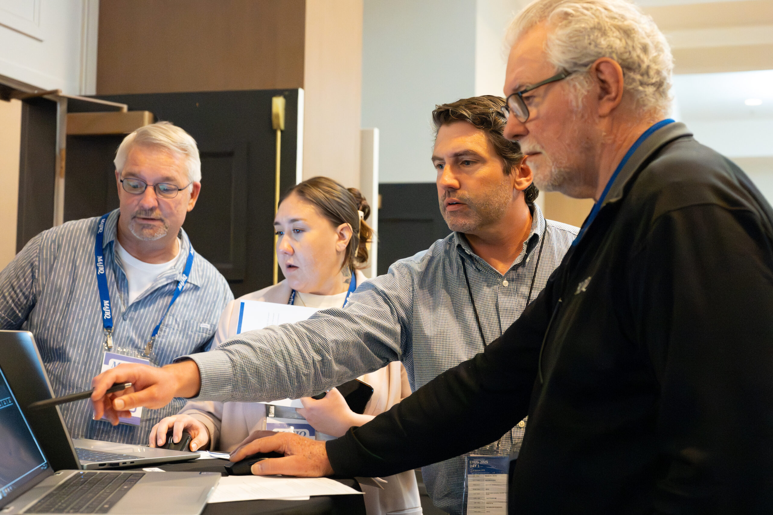 emug-2025-attendee-working-with-majiq-employee-in-tech-lab